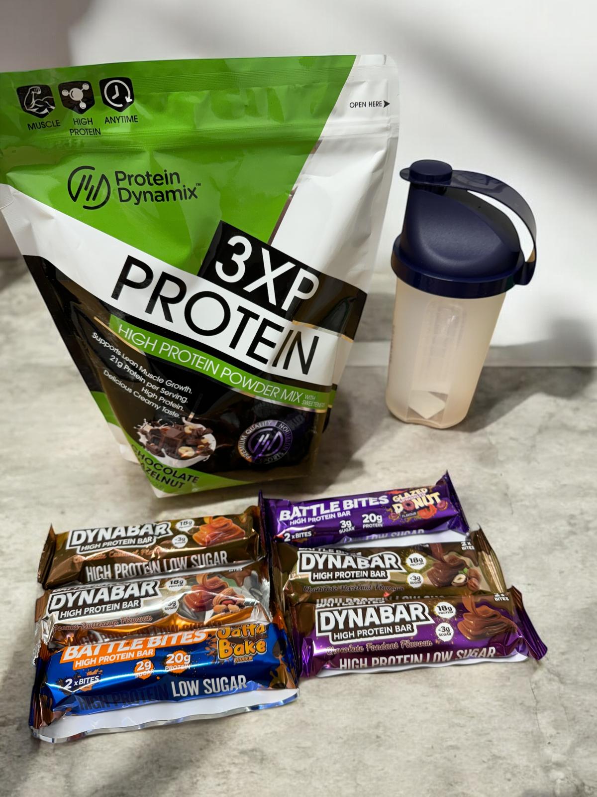 Dynamix chocolate hazelnut protein, 6 protein bars picked from a selection of delicious flavours and a FREE 500ml shaker 